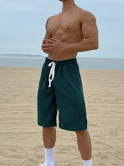 Men's Mid-Length Pocketed Drawstring Shorts