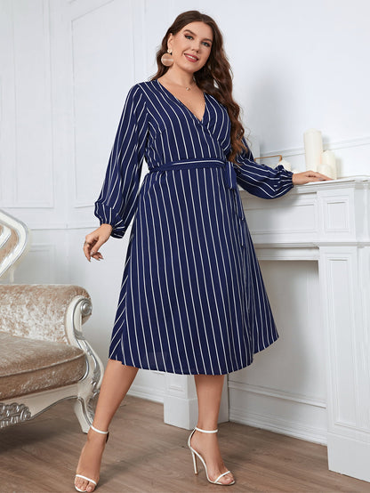 Honey Melo Apparel Plus Size Striped Surplice Neck Long Sleeve Dress